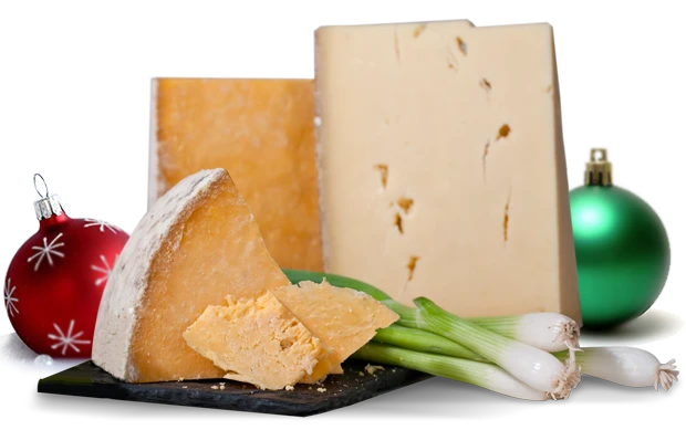 cheese of the month club - cheeses on slate board